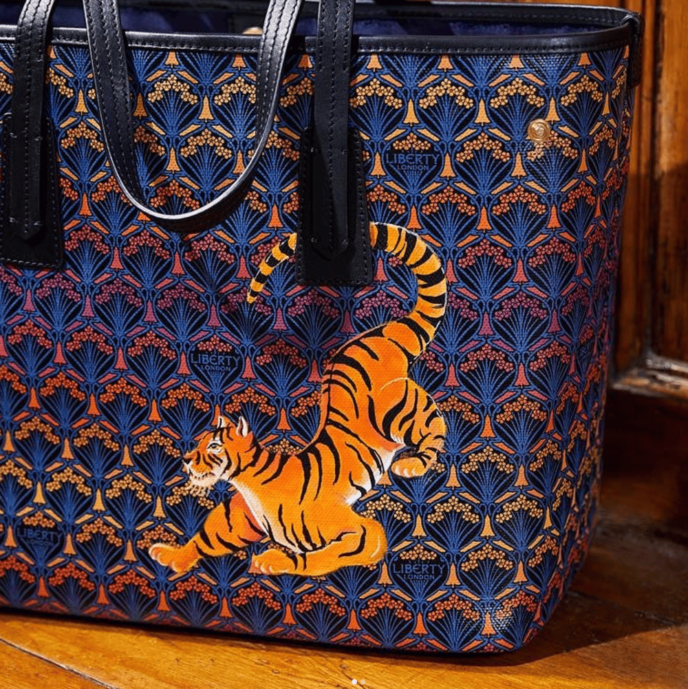 hand painted tiger on a handbag