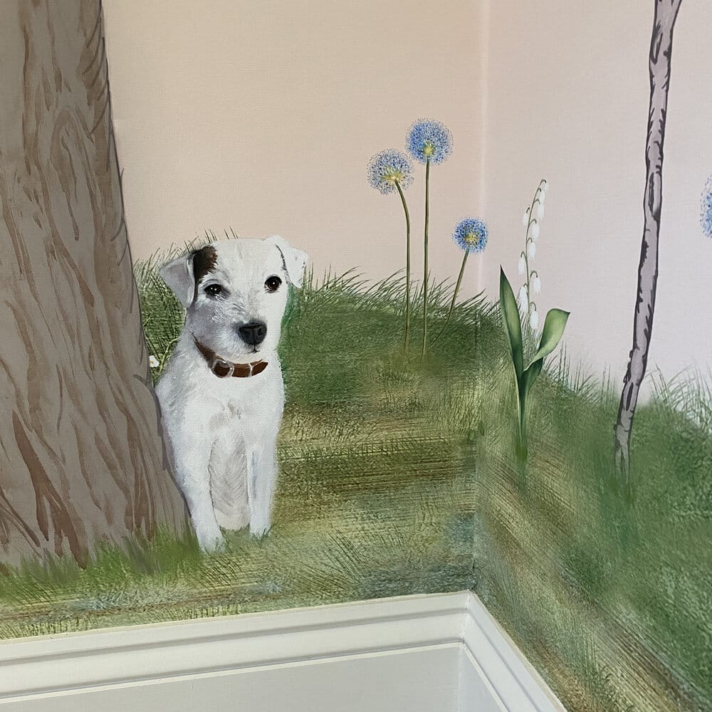 hand painted wallpaper with a dog next to a tree