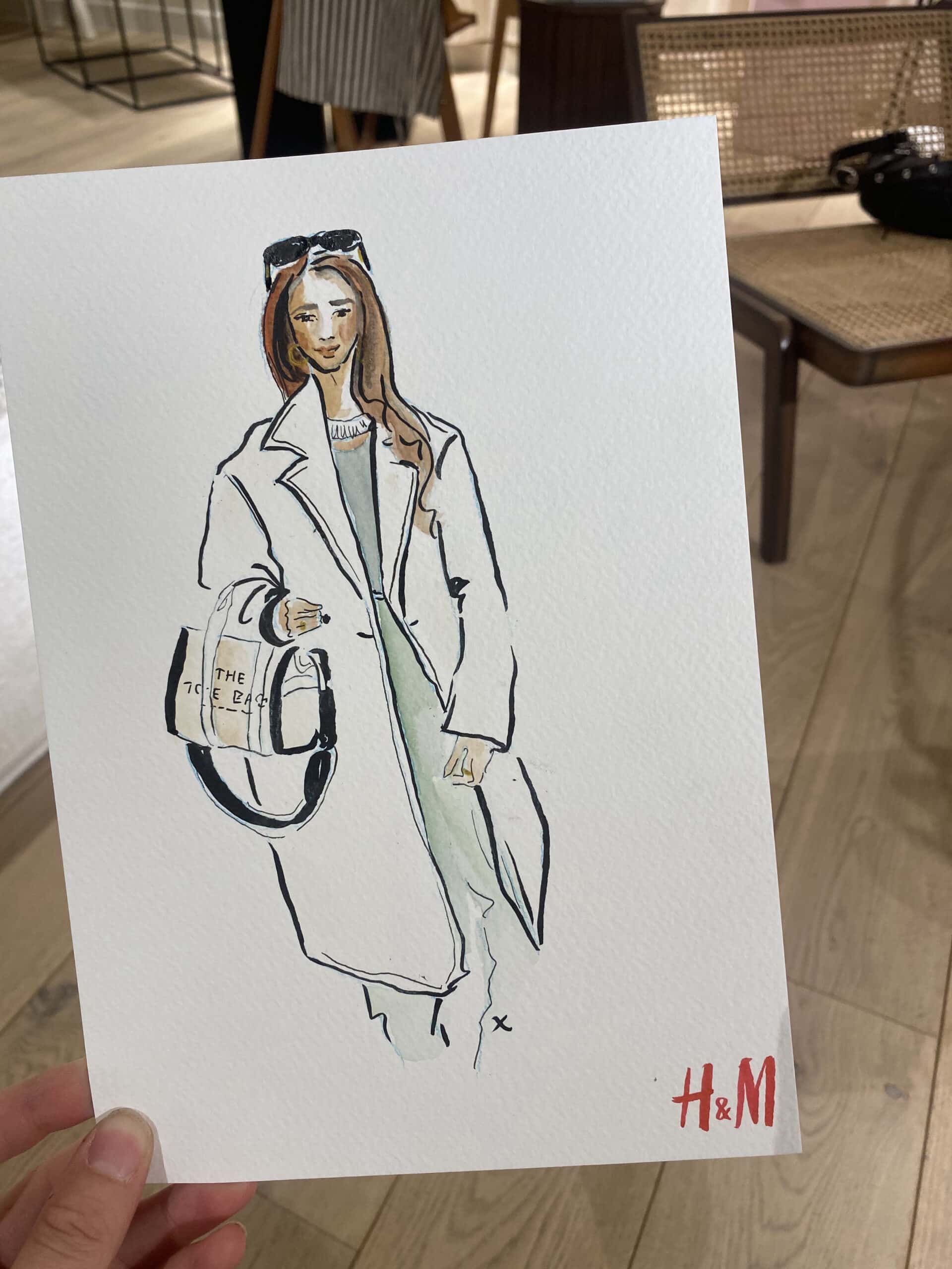 illustration of a lady and h&m logo 2